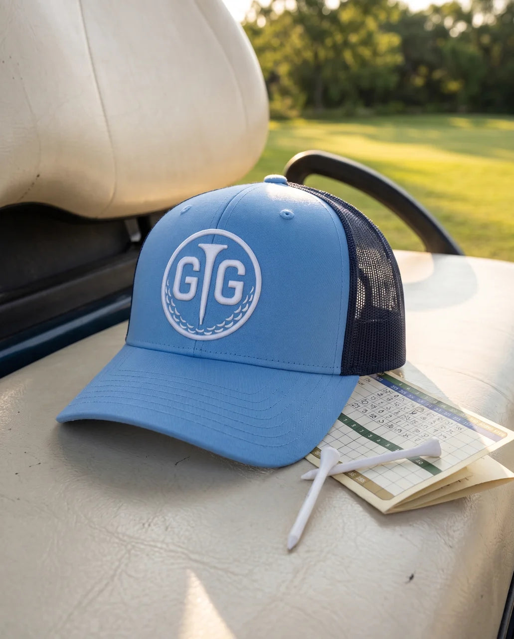 Good Too Golf cap and a well-played scorecard