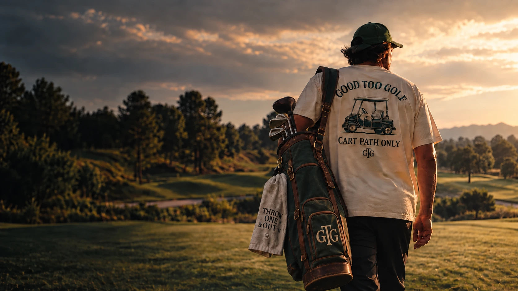 A Good Too Golf golfer carrying a bag into the golden evening